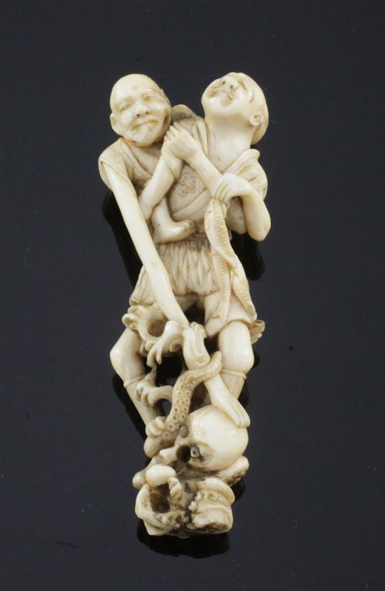 A Japanese ivory okimono of Ashinaga and Tenaga, Meiji period, 6.8cm